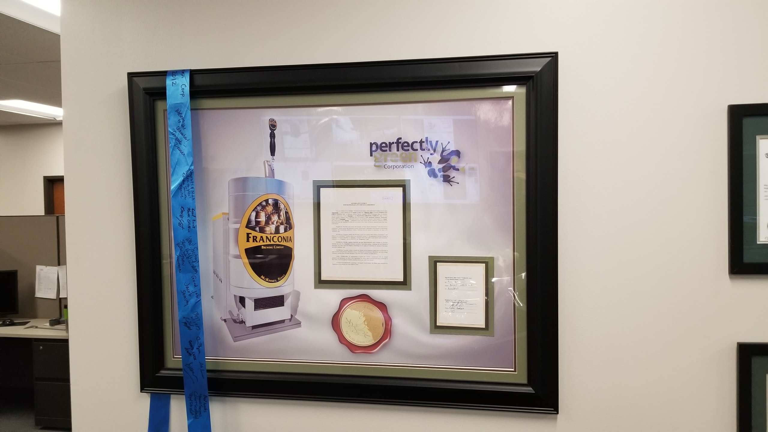 Framed Perfectly Green corporate display and technology image